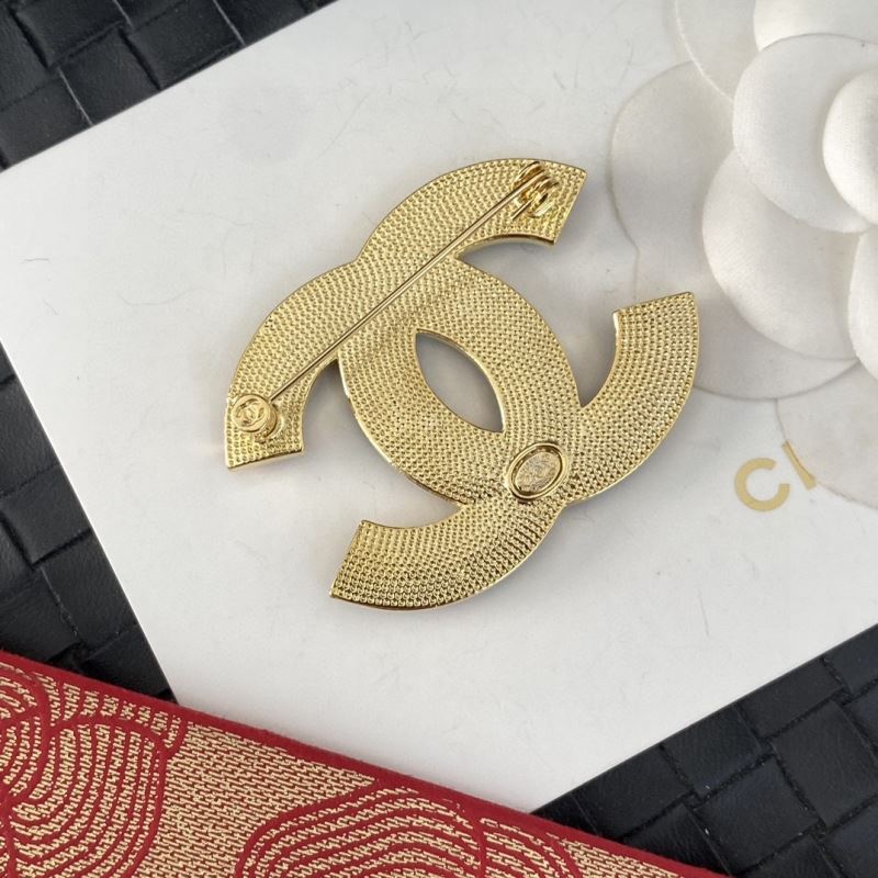 Ch**el brooches